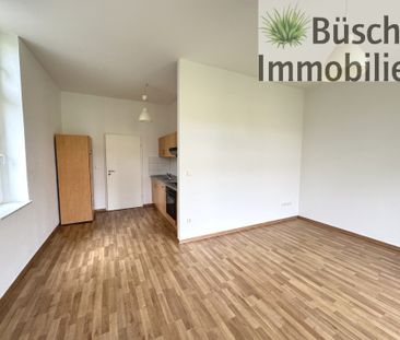 Attraktive 1-Raum-Wohnung mit Terrasse und Einbauküche! - Photo 1