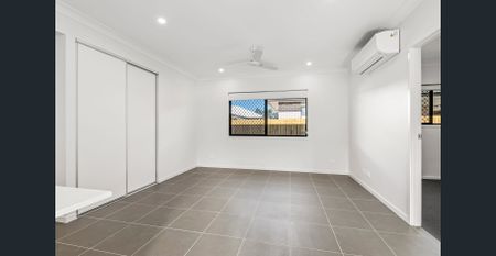 BRAND NEW SPACIOUS AND MODERN 4 BEDROOM HOME AVAILABLE NOW! - Photo 2