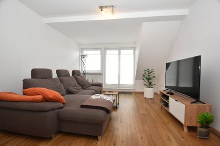 In perfekter, zentraler Lage in Friesoythe wohnen! Top-gepflegte Dachgeschosswohnung mit Südbalkon - Photo 2