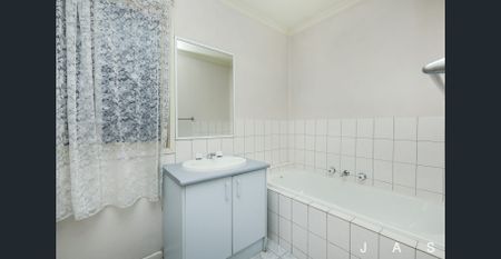 Spacious Family Home Offering Style and Village Living - Photo 4