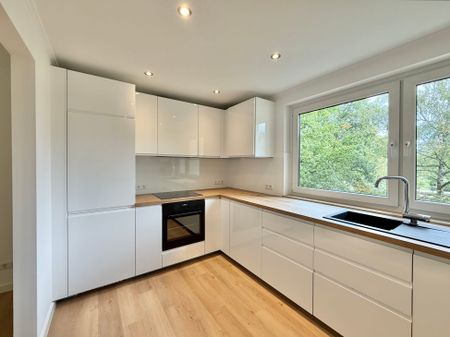 Erstbezug: Moderne & helle 3-Zimmer-Wohnung mit sonnigem Balkon + schöner Aussicht - Foto 5