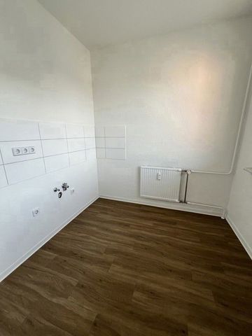 Sanierte 4-Raum-Wohnung mit Balkon! - Foto 2