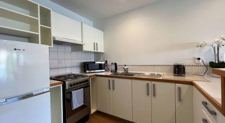 Clean and Tidy Two-Bedroom Apartment with Stunning Views - Photo 5