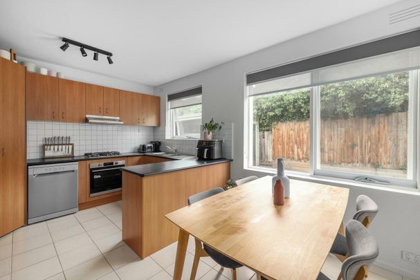 TWO BEDROOM BEAUTY IN SOUGHT AFTER LOCATION - Photo 1