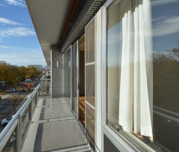 APPARTEMENT MET 2 SLAAPKAMERS EN GARAGE, MET ZICHT OP PARK - Photo 6