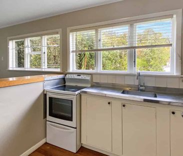 Modern & Convenient Three-Bedroom Townhouse - Photo 2