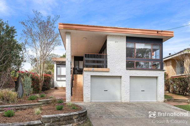 Meticulously Renovated 4-Bedroom Home - Photo 1