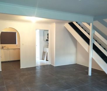 Renovated Townhouse In Convenient Location! - Photo 1