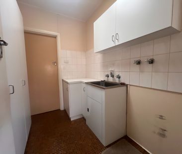 Comfortable Three-Bedroom Home in a Convenient Location - Photo 1