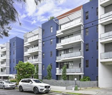 Ultra modern two bedroom apartment in convenient Homebush location - Photo 2