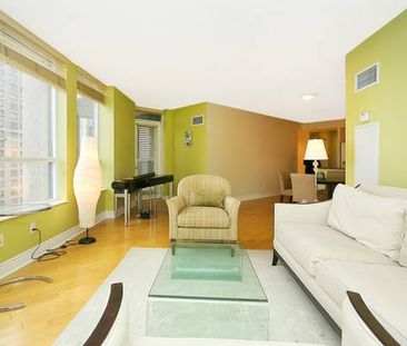 Cheerful 2 Bedroom with 2 Bathrooms plus Balcony and Hardwood Floors - Photo 3