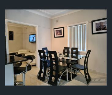 Family Home with Carport and Double Garage - Photo 3