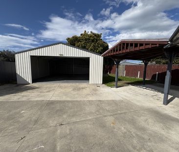 4 Bedrooms + Huge Garage + Pet Friendly! - Photo 1