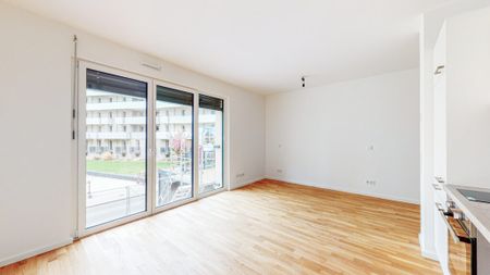 Singlewohnung mit Einbauküche und Fußbodenheizung - Photo 3