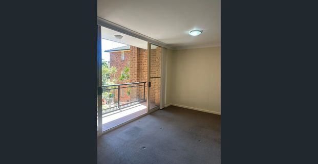 Prime Location! Secure 2-Bedroom Unit with Lock-Up Garage - Photo 1