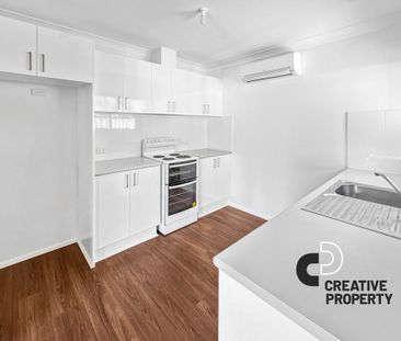 Renovated Two-Bedroom Flat Offering Comfort & Convenience - Photo 6
