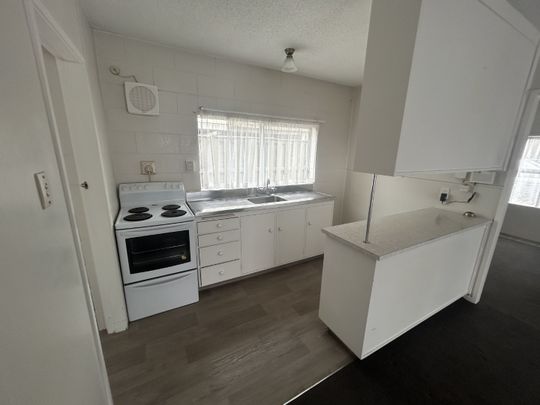 This tidy two-bedroom ground-floor unit is located in a quiet block which offers comfortable and easy living. - Photo 1