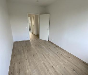 Frisch sanierte Erdgeschosswohnung mit Balkon - Foto 1