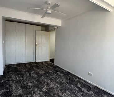 Low-Maintenance 2 Bedroom Unit in Prime Location - Photo 1