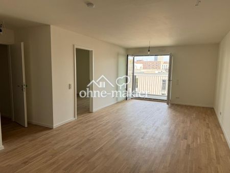Neubau Erstbezug: 2-Zimmer Wohnung mit Skyline-Blick, Südbalkon und hochwertiger Küche - Photo 2