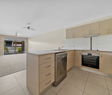 Stylish, Low-Maintenance Living in a Prime Location - Photo 1