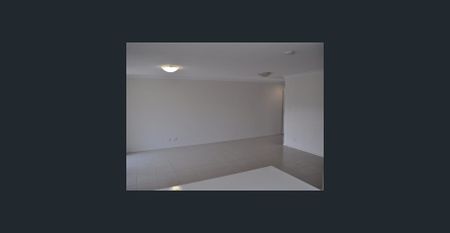 3 Level townhouse with large tandem garage - Photo 3