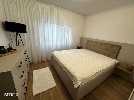 Apartament 2 camere amenajat ultramodern, totul nou - prima inchiriere - Photo 2