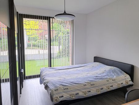 CENTRAAL GELEGEN GELIJKVLOERS APPARTEMENT MET TUINTJE - Photo 4