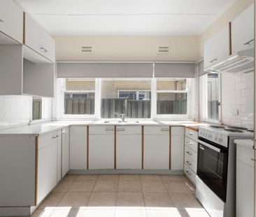 SPACIOUS 3-BEDROOM HOME with HUGE YARD and REAR STREET ACCESS - Photo 3