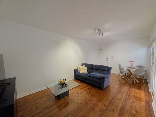 YOUNG SPACIOUS UNIT WITH COURTYARD - Photo 1