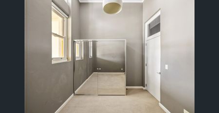 Modern home in landmark conversion with water views - Photo 4