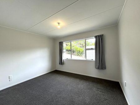 Freshly Updated 2 Bedroom Home Close to Schools and City - Ready Soon! - Photo 4