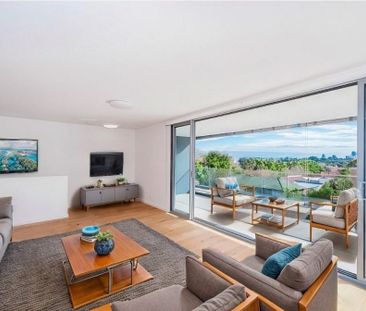 Architecturally Designed North-Facing Penthouse with Panoramic City... - Photo 2