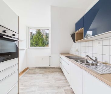 Erstbezug nach Renovierung! Helle 3-Zimmer-Wohnung mit Balkon in ze... - Foto 6