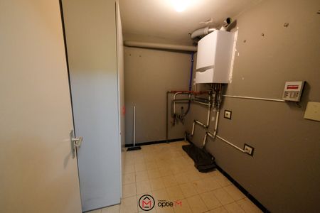 Ruim gelijkvloers appartement met drie slaapkamers in Bilzen - Foto 5