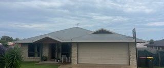 LOW SET BRICK HOME WITH LARGE FENCED YARD - Photo 1