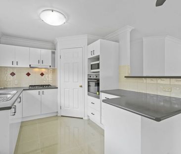 Spacious Four Bedroom Family Home in Prime Location - Photo 6