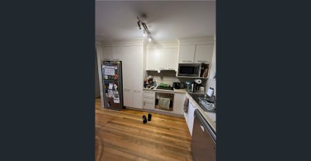 Centrally Located Furnished Unit - Photo 5