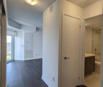 Feels brand new floor to ceiling windows! - Photo 4