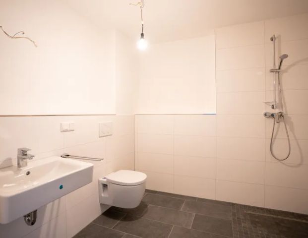 Neubau Etagenwohnung im 2.OG - Foto 1