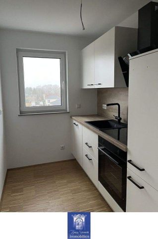 Willkommen im modernen Erstbezug! Perfekter Zuschnitt, EBK, schöner Balkon und Lift! - Photo 2