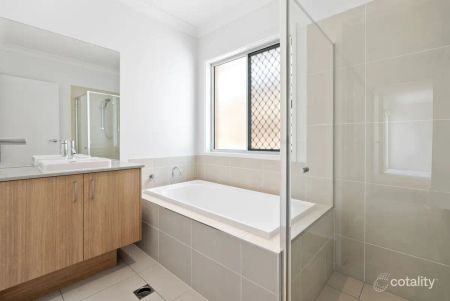 “Affordable, new home in a quiet, family-friendly residential neighbourhood.” - Photo 2