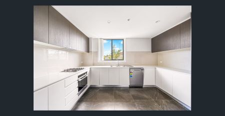 MODERN TWO-BEDROOM APARTMENT IN PRIME LOCATION! - Photo 3