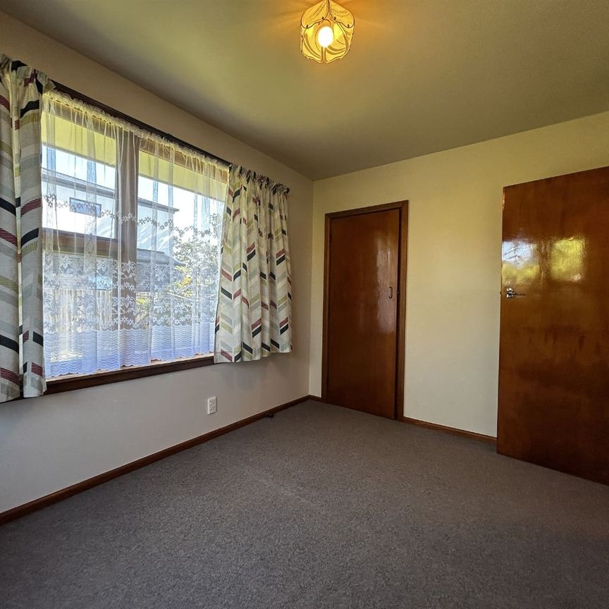 Two Bedroom Unit with Private Garden and Garage - Photo 1