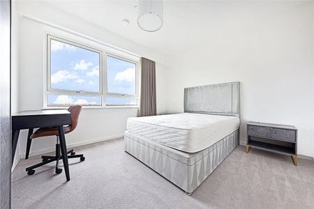 This contemporary apartment is located within Wallbrook Gardens, a beautiful development benefitting from exceptional on site amenities, communal gardens and only a 6 minute walk to Canning Town Station. - Photo 3