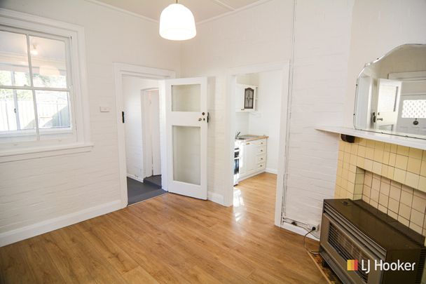 COSY & CLOSE TO TOWN - Photo 1