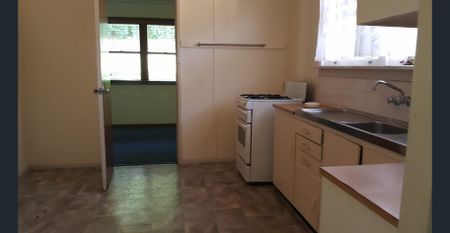 3 Bedroom + Sleepout Brick and Tile Home - Photo 2