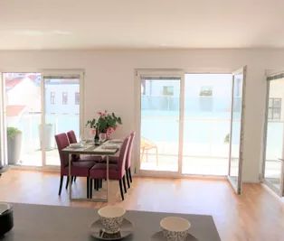 Luftige Designer-Whg im 7. Stock mit 16 m2 Terrasse in den grünen Innenhof - Foto 1