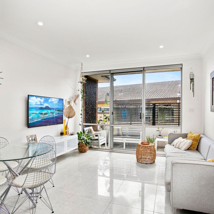 Contemporary Apartment Living with Beautiful District Views - Photo 1