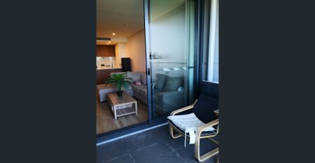 Fully Furnished Two-Bed Apartment with Stunning Water & Park View - Photo 4